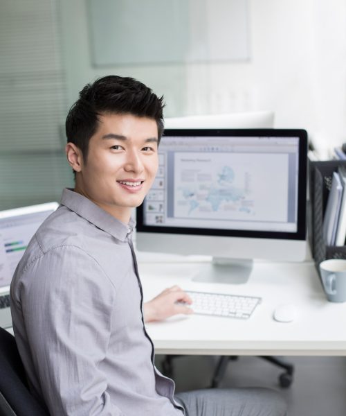 imgi_38_young-businessman-using-computer-in-office-2024-10-16-15-53-51-utc-1